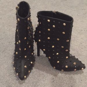 Black and gold boots